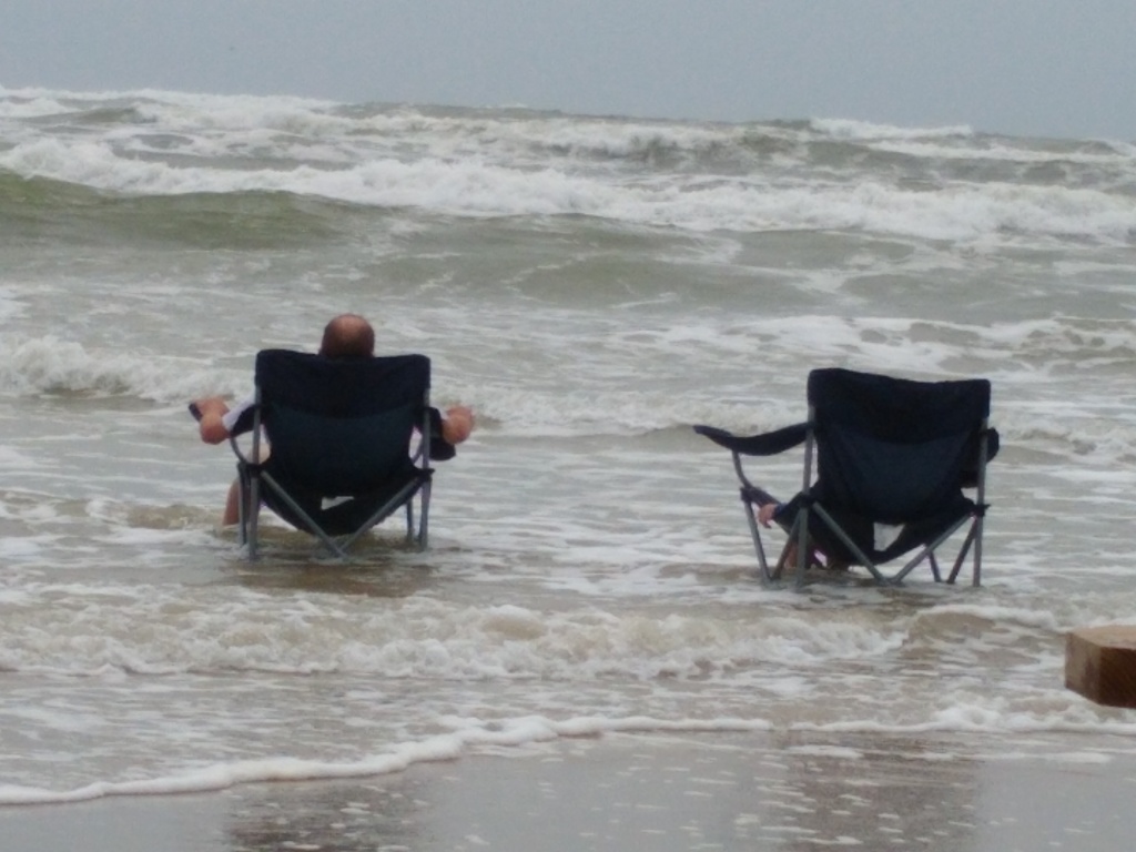 Camp chairs in the surf, Padre Island